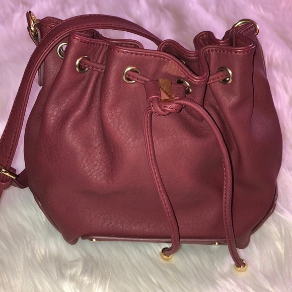 Handbags - Burgundy bucket cross body bag